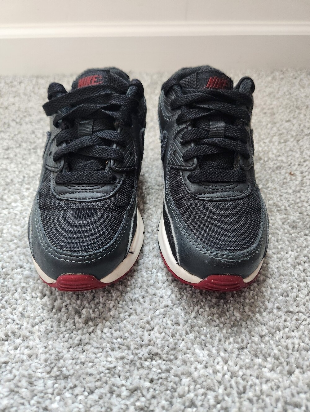 Nike Kids Black Sneakers with Pink Accents